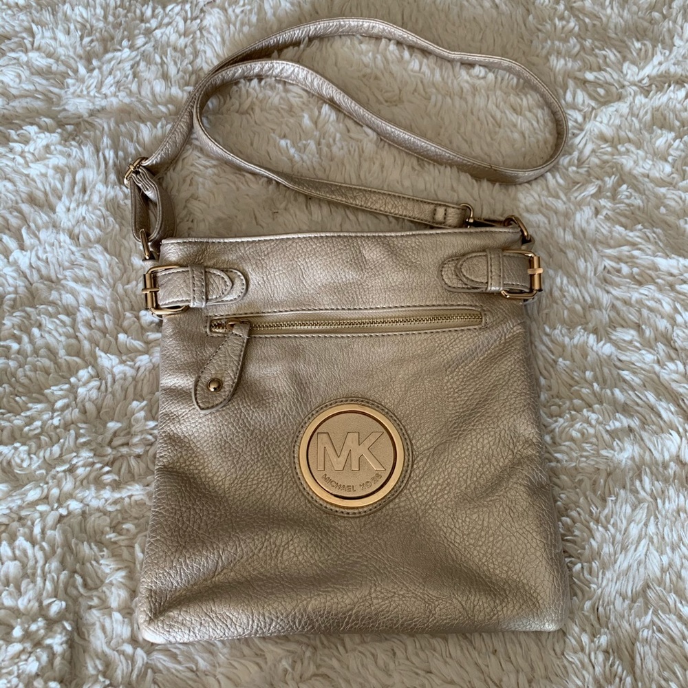 Michael Kors leather cross body purse. Medium in size